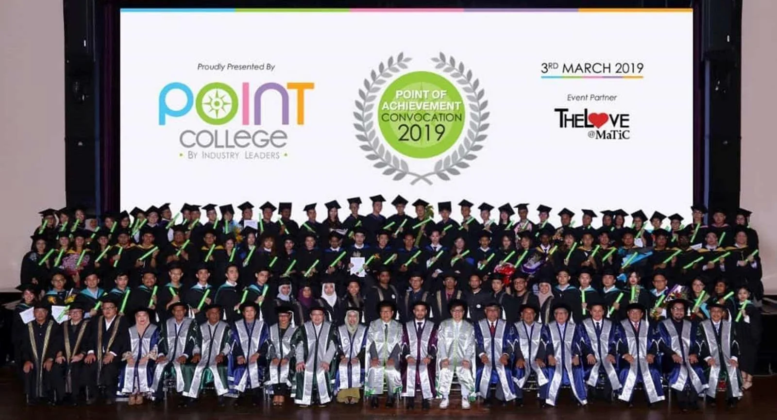Point College graduates on stage at the Point of Achievement convocation