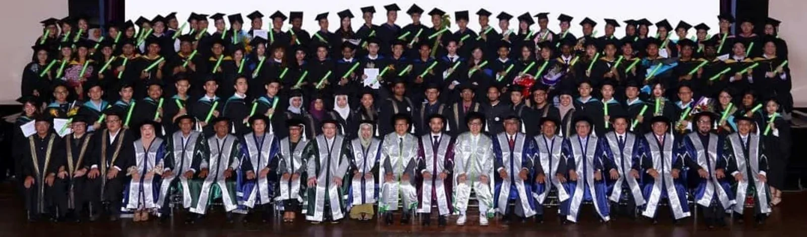 Graduates seated in rows at a convocation ceremony